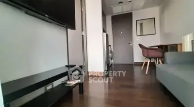 Modern apartment interior with sleek furniture and hardwood floors