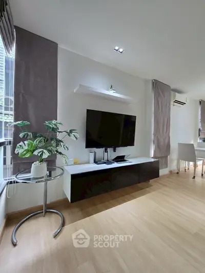 Modern living room with sleek TV setup and stylish decor