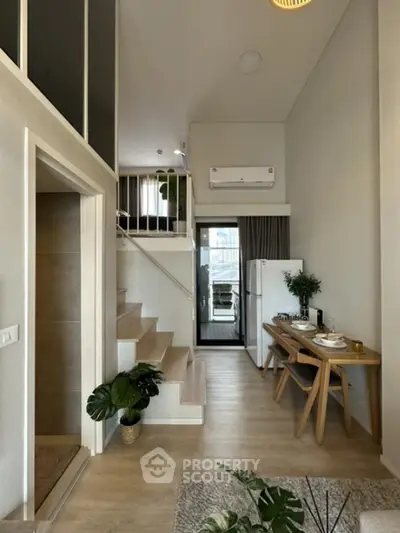 Modern duplex apartment with stylish interior and open layout