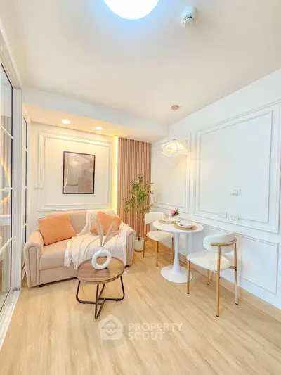 Chic and cozy living room with modern decor and dining area, perfect for urban living.