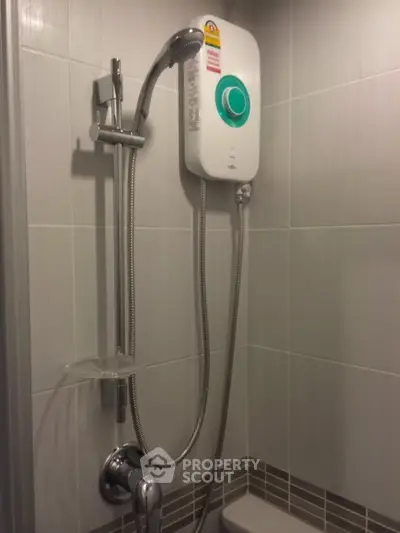 Modern bathroom with sleek shower and water heater installation