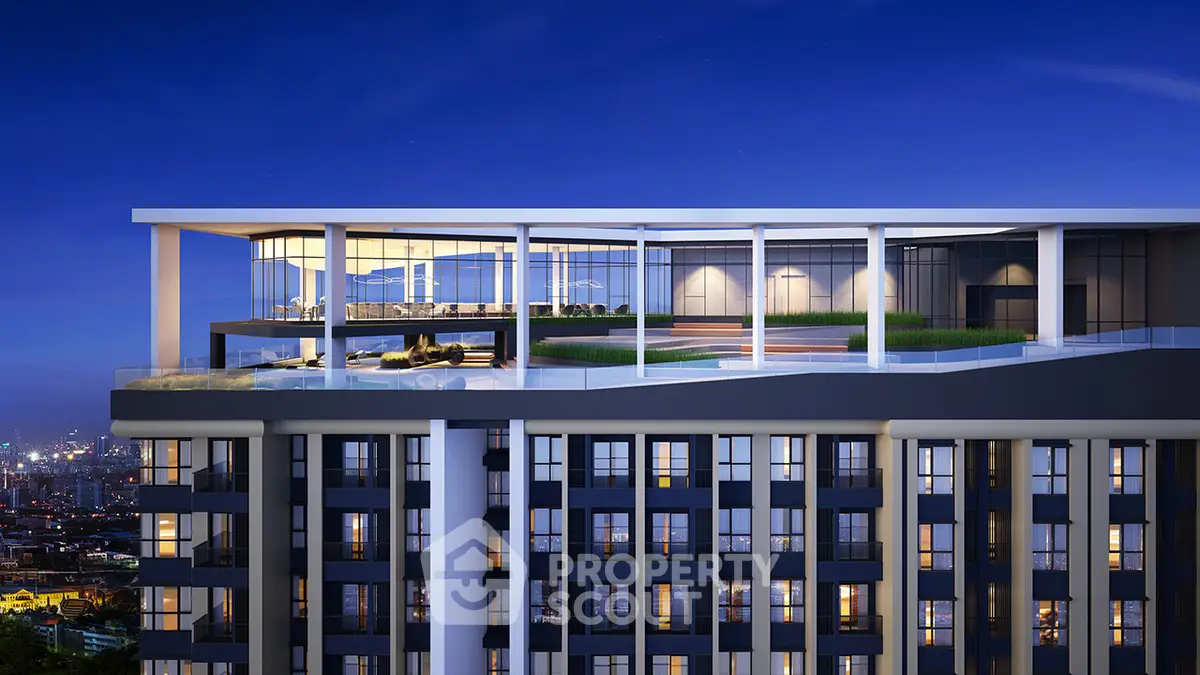 Luxurious rooftop view of modern high-rise building with cityscape backdrop, featuring sleek design and open terrace.