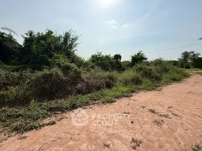 Expansive plot of land with lush greenery, perfect for development opportunities.