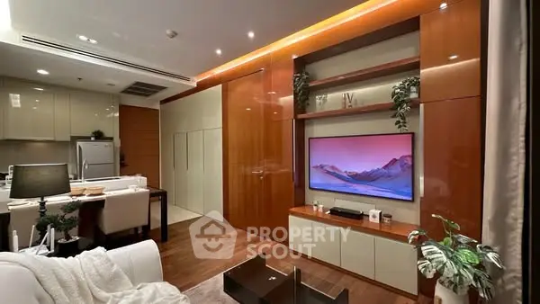 Luxurious modern living room with sleek design and integrated kitchen, perfect for contemporary living.