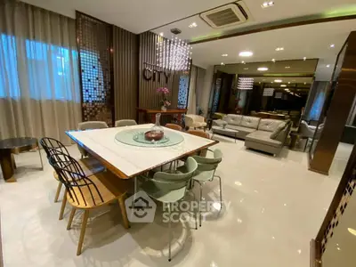 Luxurious modern living room with elegant dining area and stylish decor