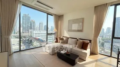 Luxurious corner unit living room with stunning city views and elegant decor.