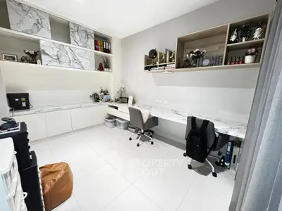 Modern study room with marble desks and ample storage space