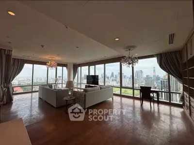 Luxurious corner unit living room with panoramic city views and elegant furnishings.
