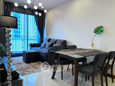 Modern living room with stylish decor and large window view