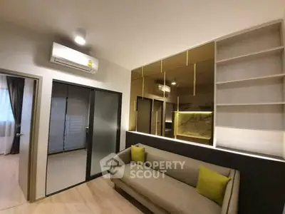 Modern living room with stylish sofa and built-in shelves