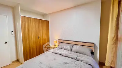 Cozy bedroom with modern wooden wardrobe and soft lighting