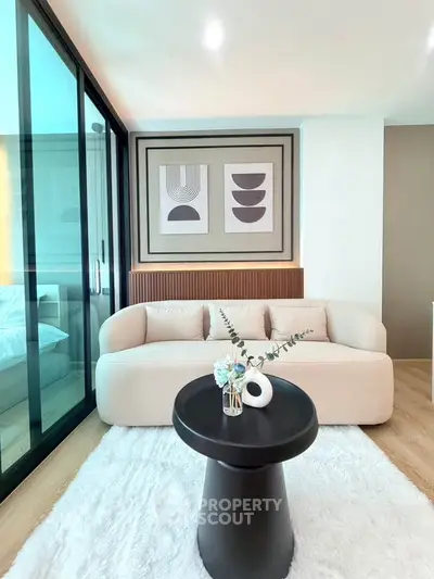 Modern living room with stylish decor and cozy seating area