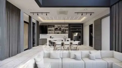 Luxurious open-plan living room with modern kitchen and elegant dining area.