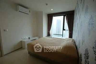 Modern bedroom with city view and stylish wallpaper