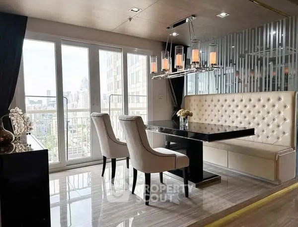 Luxurious dining area with elegant seating and city view