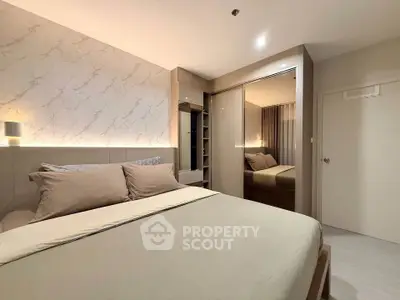 Modern bedroom with elegant design and cozy lighting