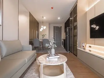 Modern living room with sleek furniture and elegant decor in a stylish apartment.