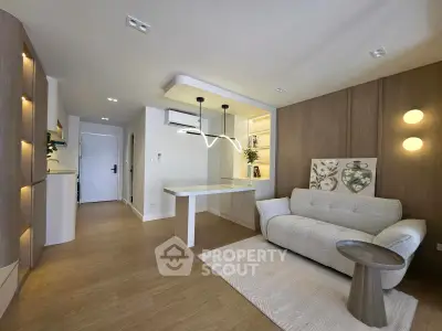 Modern living room with stylish lighting and cozy sofa in a contemporary apartment.