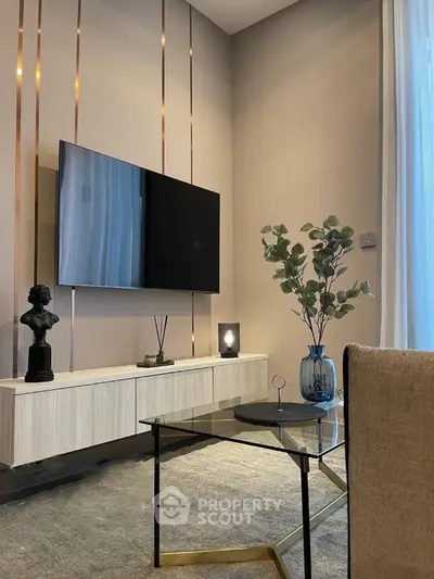 Modern living room with sleek TV setup and elegant decor