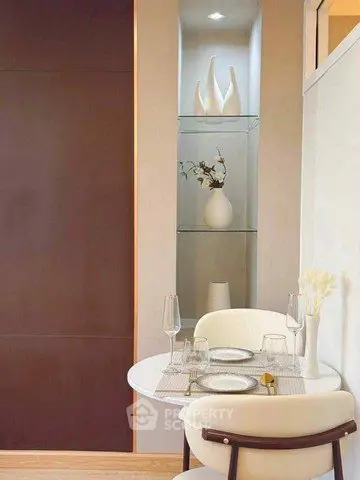 Chic dining nook with modern decor and elegant table setting in a stylish apartment.