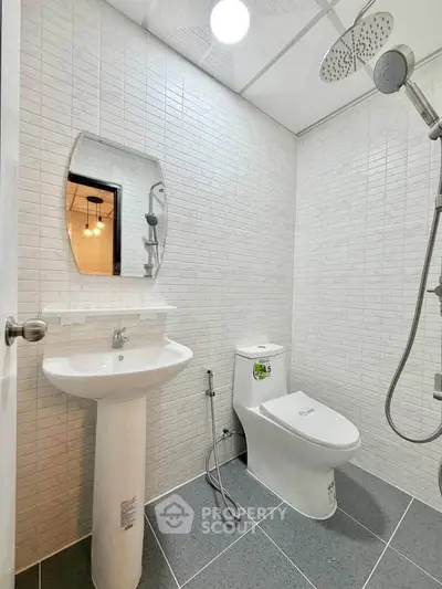 Modern bathroom with sleek fixtures and stylish tile design