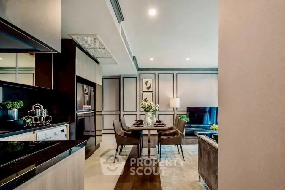 Luxurious open-plan living and dining area with modern decor and elegant furnishings.
