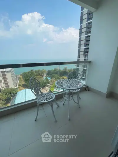 Stunning balcony with ocean view in modern high-rise apartment