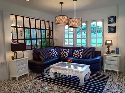 Charming living room with elegant decor and stylish furniture, perfect for cozy gatherings.