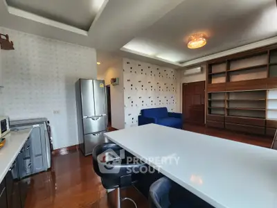 Spacious modern living room with open kitchen and stylish furniture