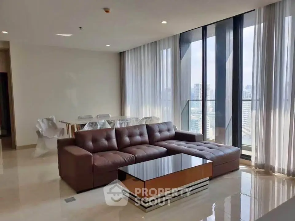 Luxurious living room with modern furniture and stunning city view