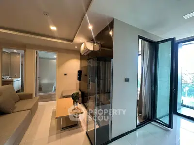 Modern living room with sleek design and balcony access