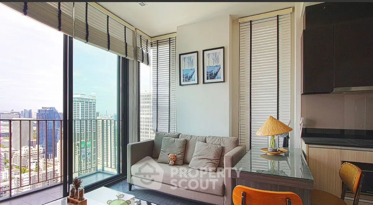 Modern living room with city view and stylish decor in high-rise apartment