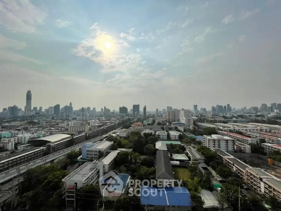 Stunning cityscape view from high-rise building showcasing urban skyline and vibrant city life.