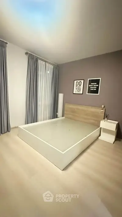 Modern minimalist bedroom with sleek design and natural light