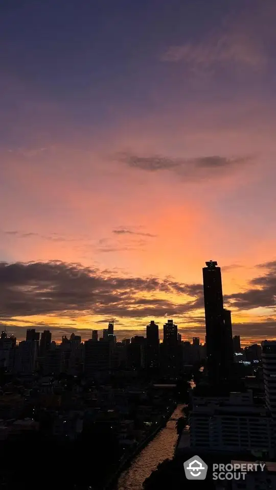 Stunning city skyline at sunset with vibrant sky colors