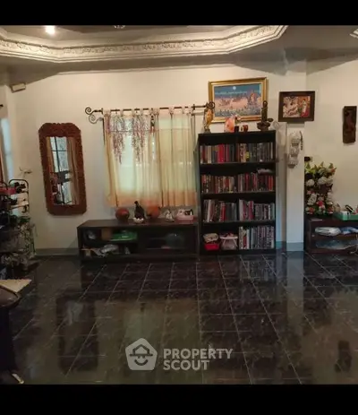 Charming living room with elegant decor and ample natural light