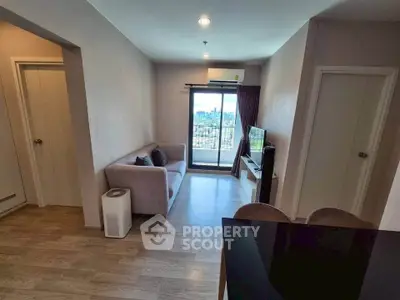 Modern living room with city view and cozy furniture