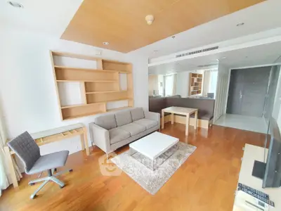 Spacious modern living room with wooden flooring and stylish furniture