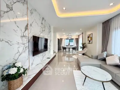Luxurious modern living room with marble accents and elegant decor