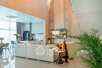 Luxurious modern living room with high ceilings and elegant decor