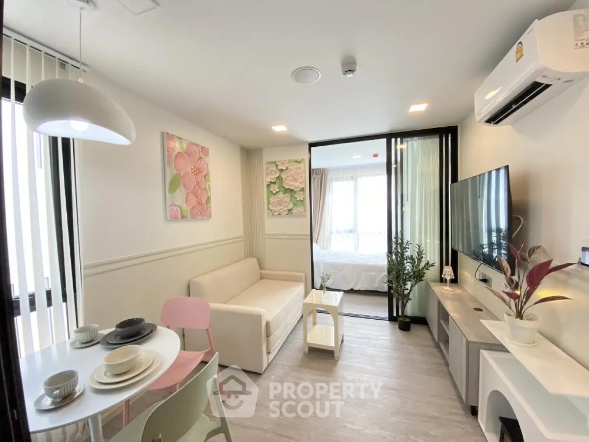 Modern living room with open layout and stylish decor in a cozy apartment