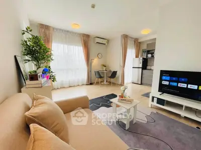 Modern living room with cozy sofa, dining area, and natural light in stylish apartment.