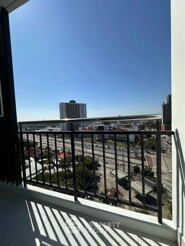 Stunning high-rise balcony view overlooking cityscape and skyline