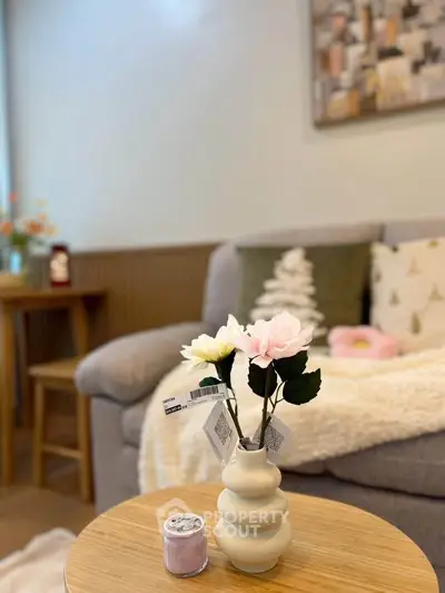 Cozy living room with stylish decor and comfortable seating, perfect for relaxation and entertaining.