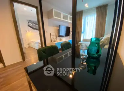 Modern apartment interior with stylish decor and open layout, featuring a cozy living area and elegant furnishings.