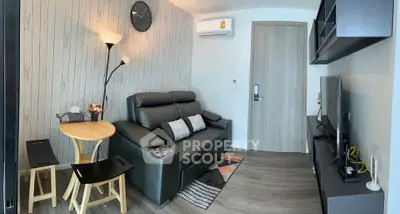 Cozy living room with modern decor and comfortable seating