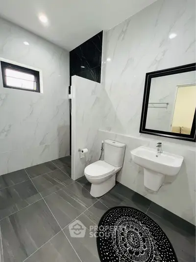 Modern bathroom with sleek design and elegant marble tiles