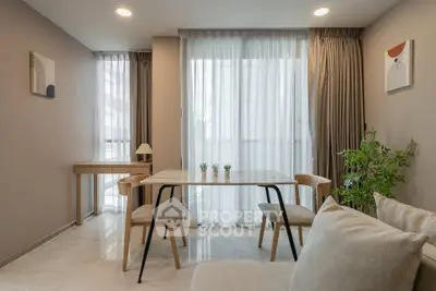 Modern living room with elegant dining area and natural light