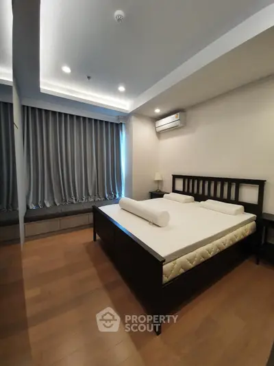 Spacious bedroom with modern design and natural light