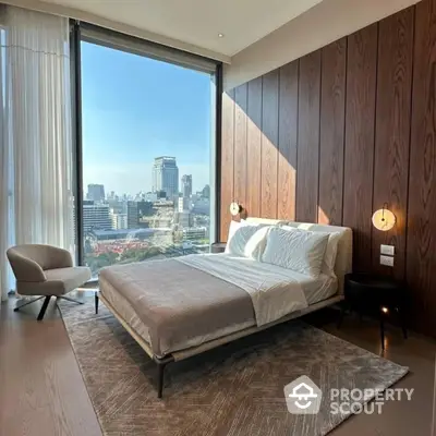 Luxurious bedroom with stunning city view and modern decor